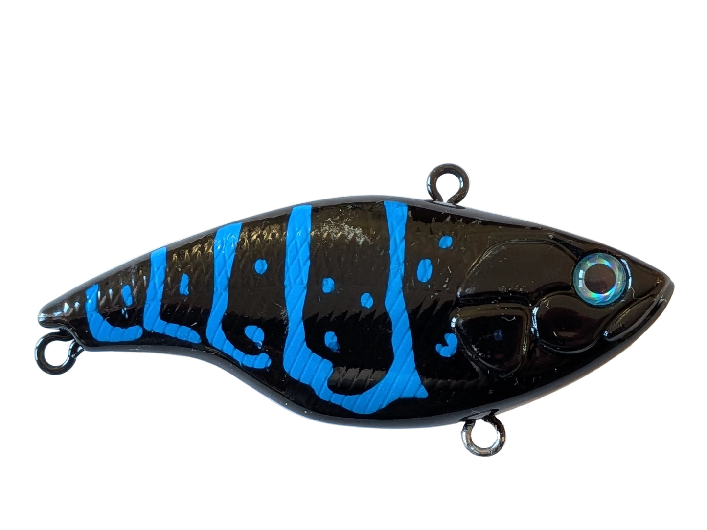 Black and blue fishing lure on a white background