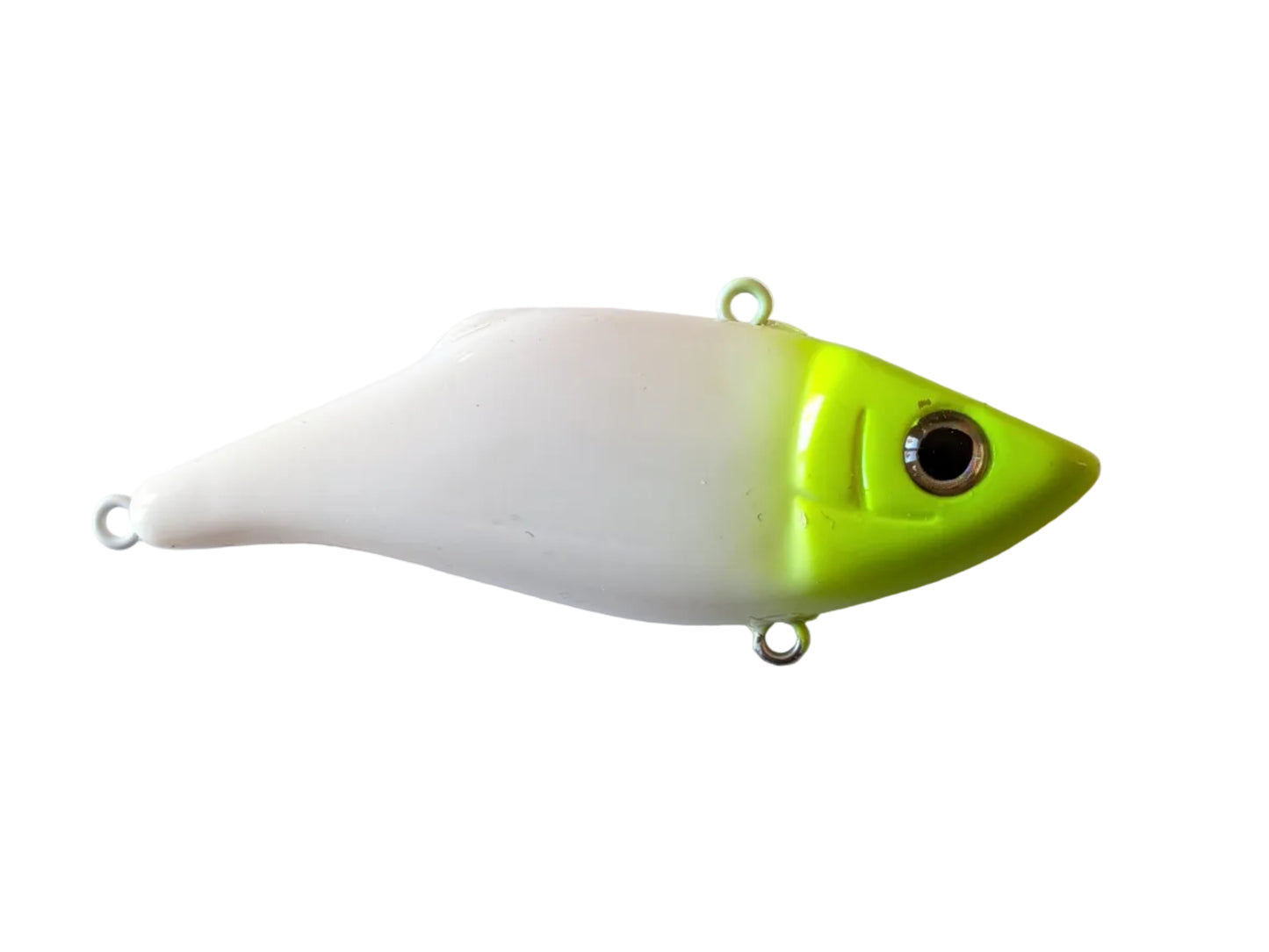 Fishing lure with a green top and white bottom on a white background